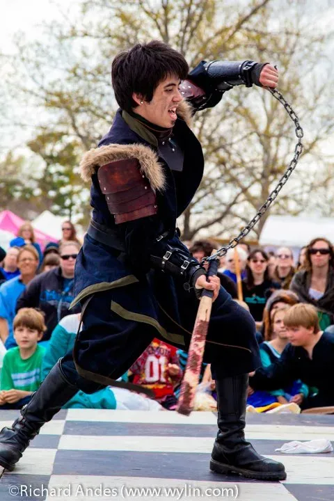 Performing a chain weapon routine in costume