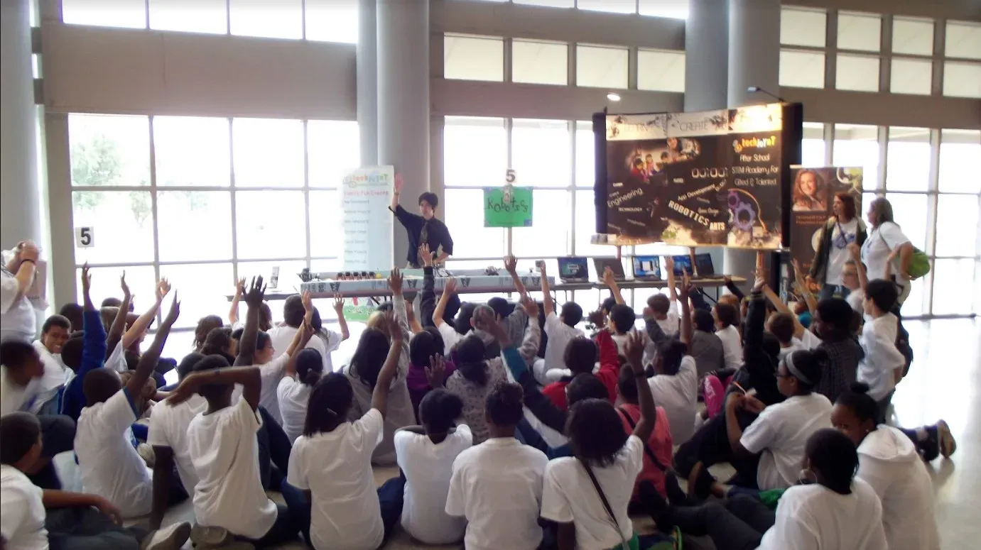 Leading a game design workshop for a room of middle school students